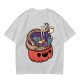 Halloween pumpkin ramen bowl with cute monster graphic t-shirt
