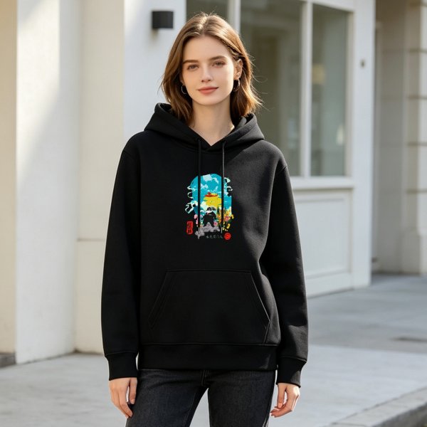 Black hoodie with vibrant anime-style nature scene graphic print