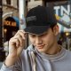 Black baseball cap with system requirements text print
