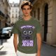 Olive t-shirt with a black cat holding a magic 8 ball and text 'Signs Point To Leave Me Alone'