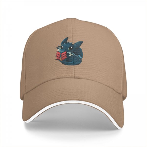 Black baseball cap featuring a cute dragon reading a red book