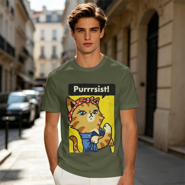 Olive green t-shirt with a cat in a Rosie the Riveter pose and 'Purrrsist!' text