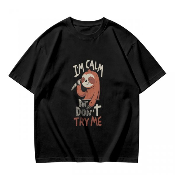 Olive graphic t-shirt with sloth holding knife and 'I'm calm but don't try me' text