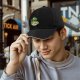 Black Baseball Cap with Cute Alien Eating Ramen Graphic
