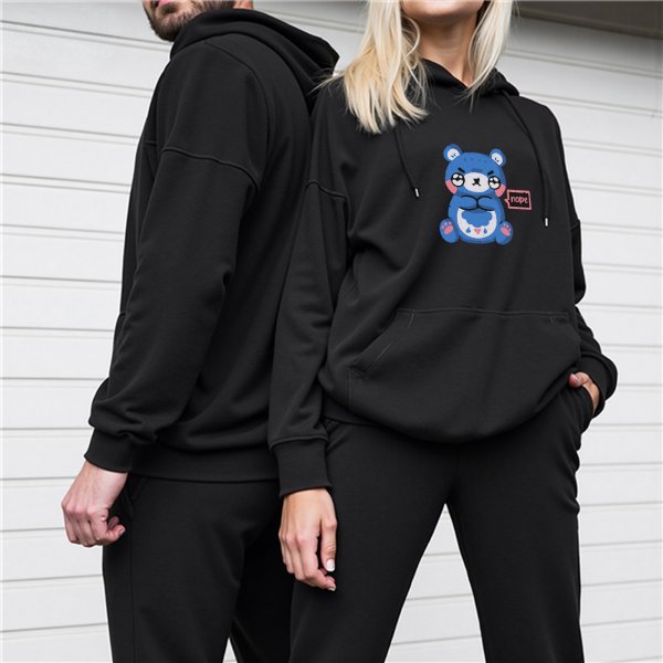 Black hoodie with grumpy blue bear graphic that says nope