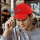 Black baseball cap with 'The Less You Know' retro graphic