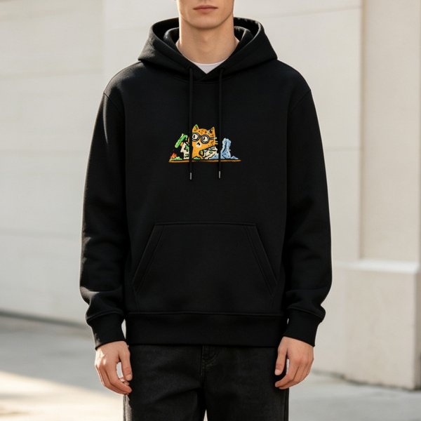 Black hoodie with a cartoon cat wearing glasses at a messy desk print