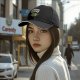 Black baseball cap with 'Working On My Core' fitness apple graphic
