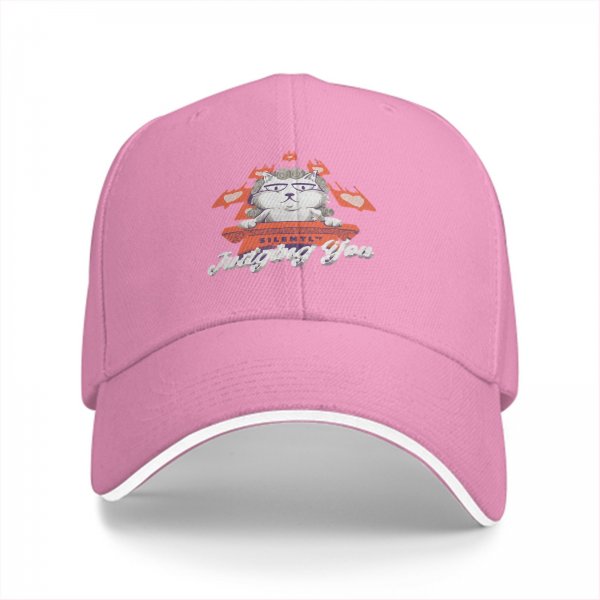 Black baseball cap with cat judge graphic and 'Silently Judging You' text