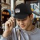 Black Baseball Cap With Scared Bowling Pins Graphic