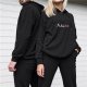 Black hoodie with cute cartoon sea creature graphic design