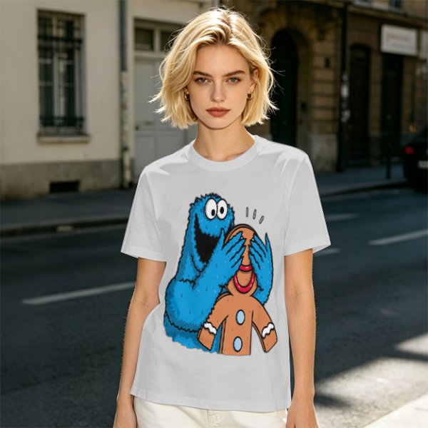 Olive T-shirt with Cookie Monster covering gingerbread man’s eyes