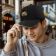 Black baseball cap with Dark Souls themed graphic print