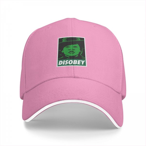 Black baseball cap with green 'DISOBEY' portrait graphic