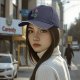 Black baseball cap with cute bat reading scary stories book print