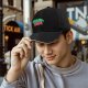 Black baseball cap with apple orchard graphic print