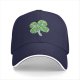 Black baseball cap with decorative four-leaf clover graphic