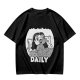 Olive green graphic t-shirt with bedridden cartoon girl and 'DAILY' text