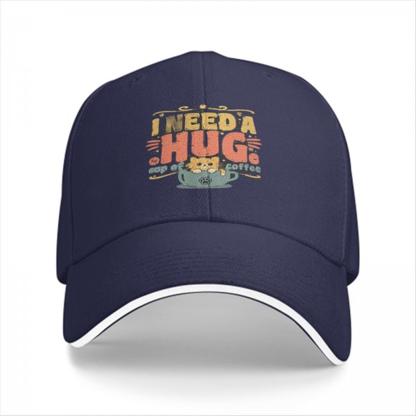 Black baseball cap with 'I need a huge cup of coffee' and cat graphic