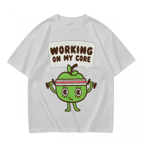 Olive green t-shirt with cartoon apple lifting dumbbells and 'Working on my core' text