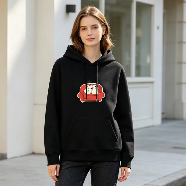Black hoodie with cute ghosts sitting on red couch graphic