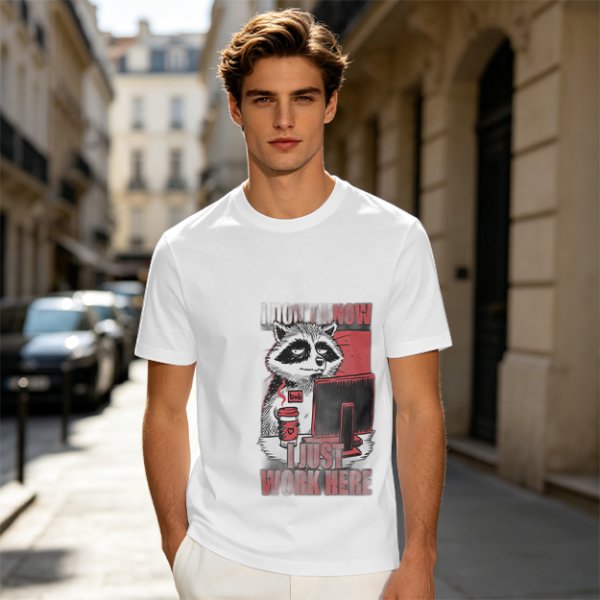 Olive graphic t-shirt with a tired raccoon office worker and 'I Just Work Here' text