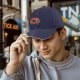 Black baseball cap with cute sushi cat graphic print