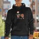 Black hoodie with cartoon heart and brain graphic print