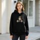 Black hoodie with sushi character riding a bicycle graphic