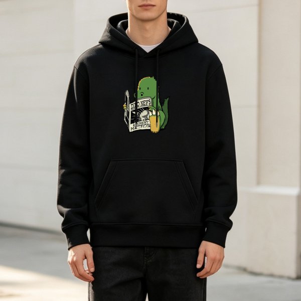 Black hoodie with cartoon dinosaur reading Dino News meteor headline
