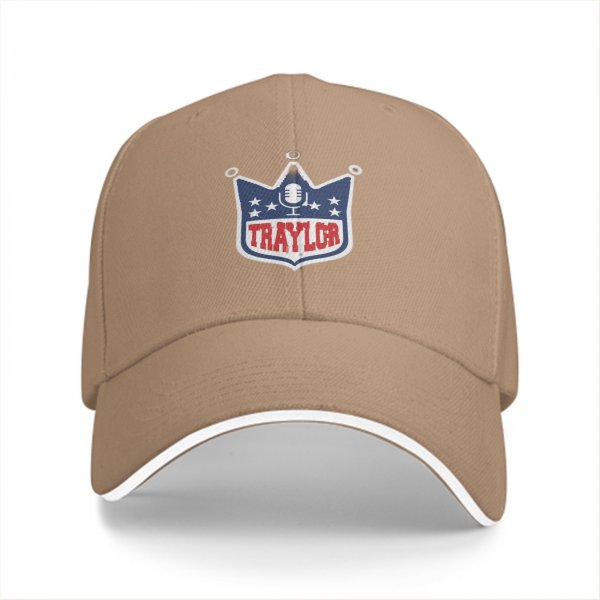 Black baseball cap with TRAYLOR crown shield logo and microphone design