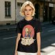 Olive T-shirt with a cat warrior riding a flying cloud graphic