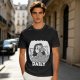 Olive green graphic t-shirt with bedridden cartoon girl and 'DAILY' text