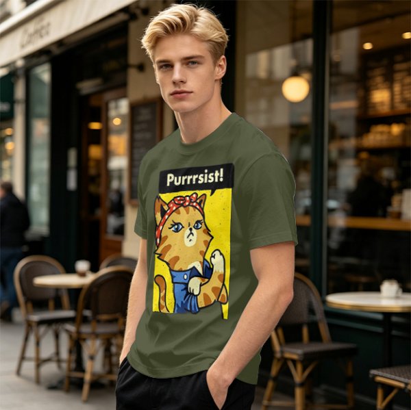 Olive green t-shirt with a cat in a Rosie the Riveter pose and 'Purrrsist!' text