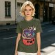 Halloween pumpkin ramen bowl with cute monster graphic t-shirt