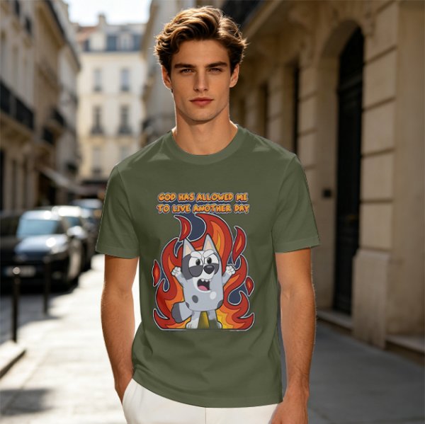 Olive t-shirt with cartoon dog and 'God has allowed me to live another day' print