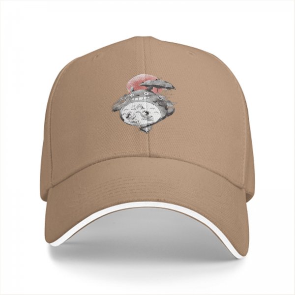 Black baseball cap with Totoro holding umbrella and red sun graphic