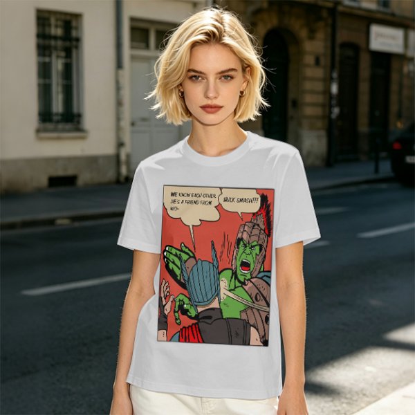 Olive t-shirt with comic print of Hulk and Thor mid-smashed interaction