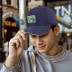 Black baseball cap with tiny drinks soda and alien graphic print
