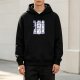 Black hoodie with vintage-style decorative text and graphic print