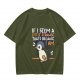 Olive t-shirt with 'If I seem a little strange that's because I am' penguin print