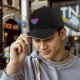 Black Baseball Cap With Blue Cat In Pink Heart Graphic