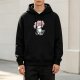 Black hoodie with cherry blossom tree and whimsical creature graphic
