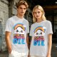 Olive T-Shirt With Cute Cloud Rainbow Graphic And 'We're All Gonna Die' Text