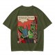 Olive t-shirt with comic print of Hulk and Thor mid-smashed interaction