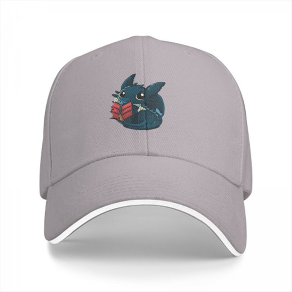 Black baseball cap featuring a cute dragon reading a red book