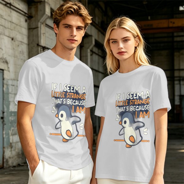 Olive t-shirt with 'If I seem a little strange that's because I am' penguin print