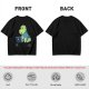 Olive t-shirt with a cartoon dinosaur working on laptop holding coffee