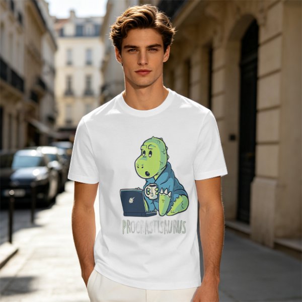 Olive t-shirt with a cartoon dinosaur working on laptop holding coffee