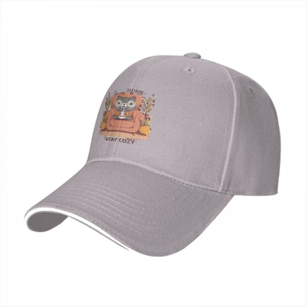Black baseball cap with cozy raccoon on armchair and stay cozy print